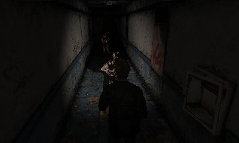 James in a narrow, dark corridor with a monster coming toward him from the far end